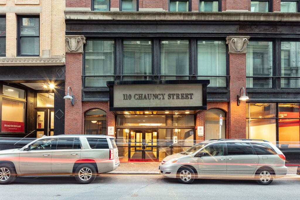 110 Chauncy Street building front entrance with large sign over the door with address